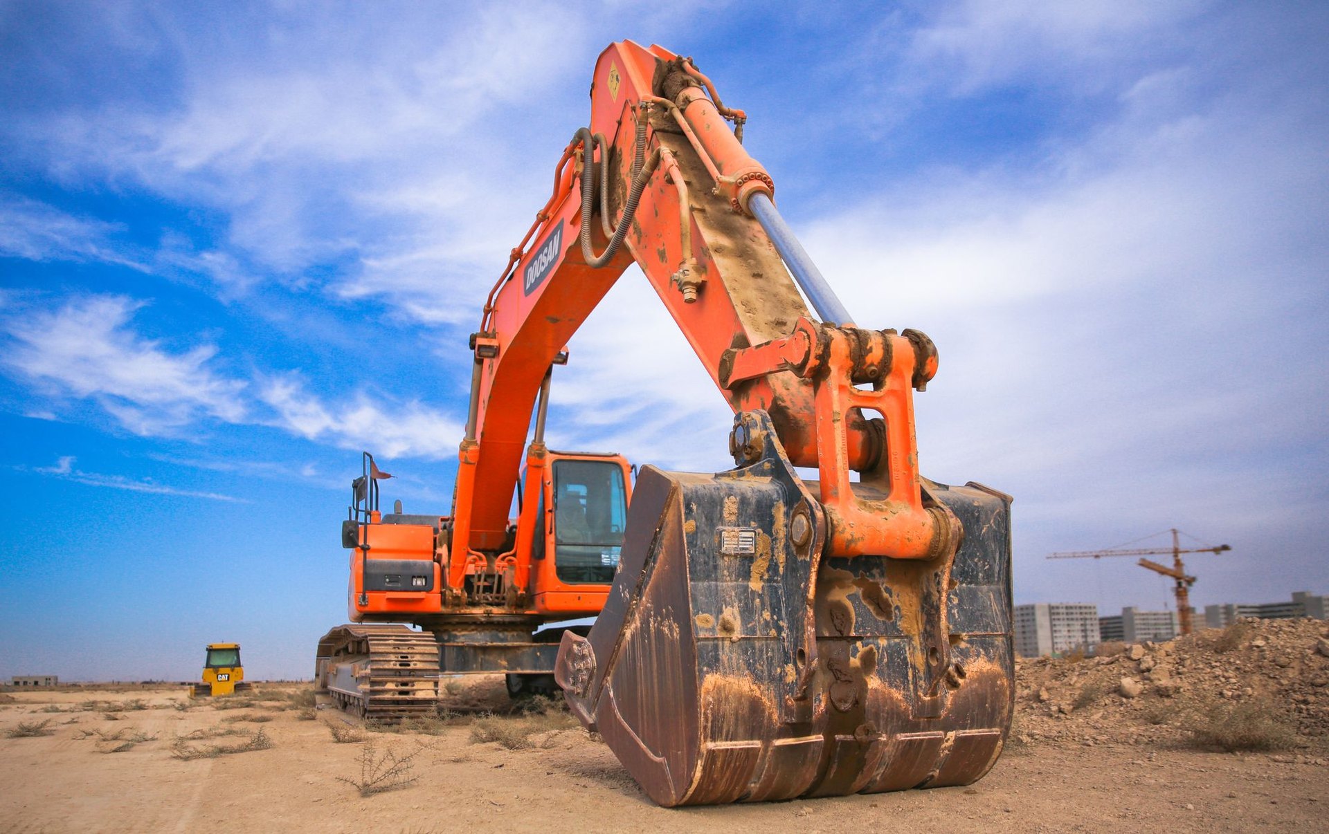 Excavation and site work by Split T Earthworks in Wichita, Kansas Excavator on a dirt site for excavating contractor Wichita, KS